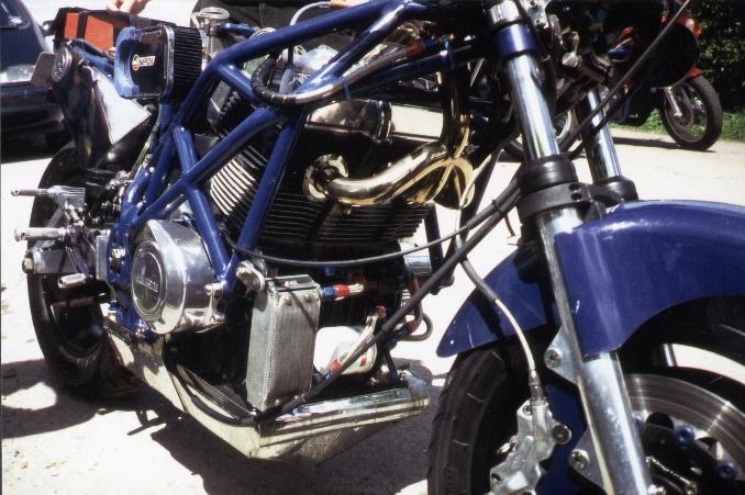 pipes lead upwards over the engine pipes lead upwards over the engine